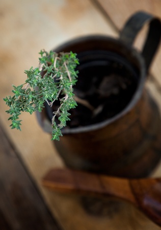 Fresh thyme on rustic wooden backgroundの写真素材
