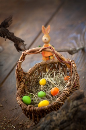Easter decoration background with colorful eggs on wooden backgroundの写真素材