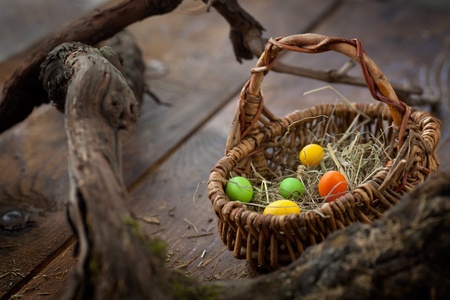 Easter decoration background with colorful eggs on wooden backgroundの写真素材