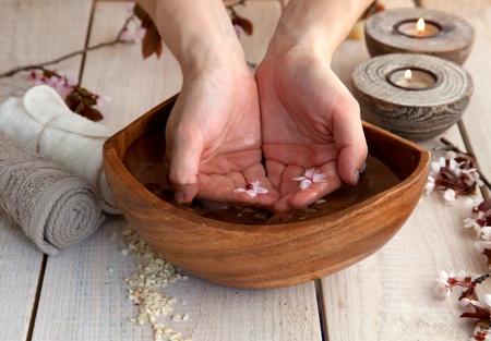 Spa and wellness manicure setting with natural soap, candles and towel  Beige dayspa nature setの写真素材