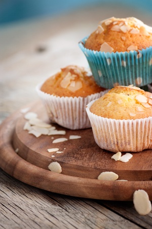 Delicious organic muffins. Almond and cherry cup cakes in natural setting.の写真素材