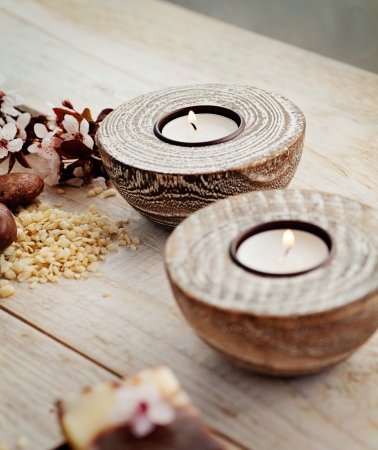 Spa and wellness setting with natural soap, candles and towel. Beige dayspa nature setの写真素材