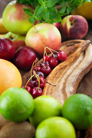 Organic Fruit variety on wood. Tropical exotic food concept.の写真素材