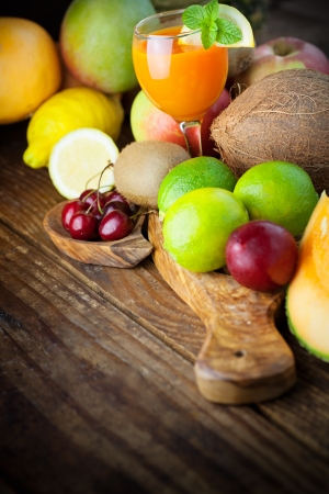 Organic Fruit variety on wood. Tropical exotic food concept.の写真素材