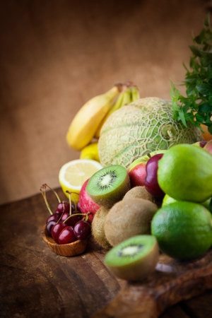 Organic Fruit variety on wood. Tropical exotic food concept.の写真素材