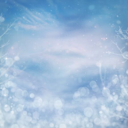 Winter snow background. Snow on the hills with blue sky in the back.の写真素材