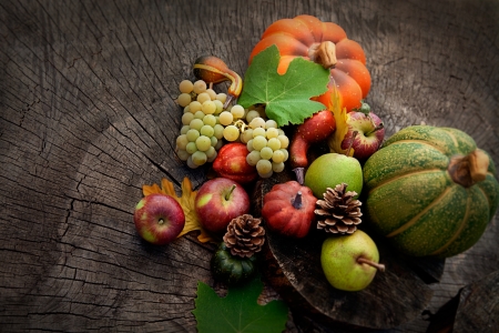 Autumn nature concept. Fall fruit on wood