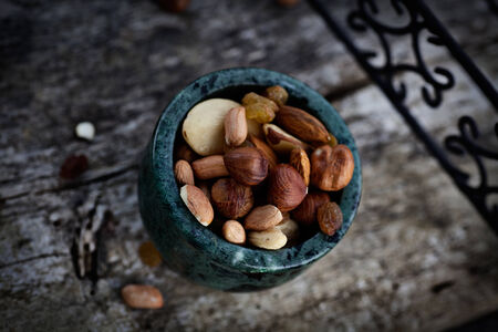 Healthy eating. Dried  fruit and nuts on wooden backgroundの写真素材