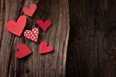Valentines Vintage  handmade hearts over Wooden Background. Valentine over Wood. Retro wallpaper. Valentines Dayの写真素材