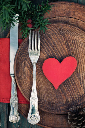 Christmas background with rustic ornaments and fir tree. Xmas vintage concept. Christmas dinnerの写真素材
