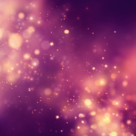 Christmas background. Festive xmas abstract background with bokeh defocused lights and starsの写真素材