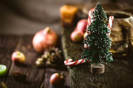 Christmas rustic decoration. Christmas tree, candles and presents