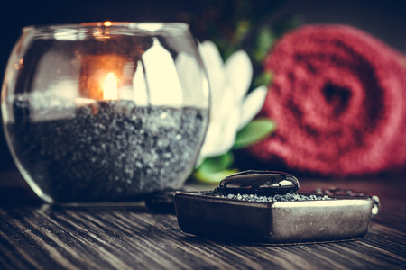Spa and wellness setting with flowers and towels. Dayspa nature productsの写真素材