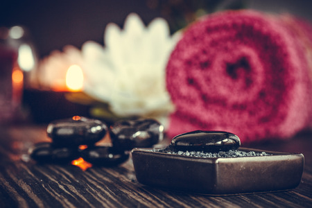 Spa and wellness setting with flowers and towels. Dayspa nature productsの写真素材