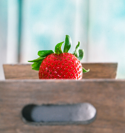 Fresh fruit. Strawberries on wood. Spring fruit.の写真素材