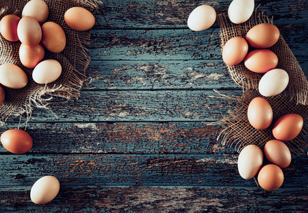 Organic eggs on wood. Fresh eggs. Healhy foodの写真素材
