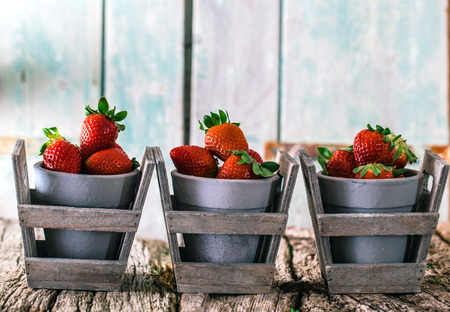Fresh fruit. Strawberries on wood. Spring fruit.の写真素材