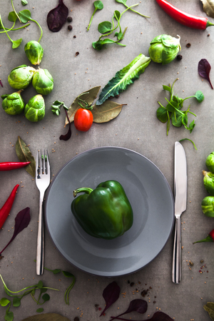 Fresh vegetables flatlay overhead frame. Food layout. Plate with vegetablesの写真素材