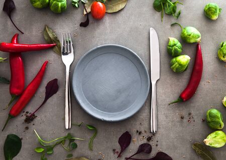 Fresh vegetables flatlay overhead frame. Food layout. Plate with vegetablesの写真素材