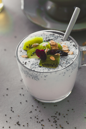 Healthy breakfast variety. Cereals with fruit. Yogurt with seedsの写真素材