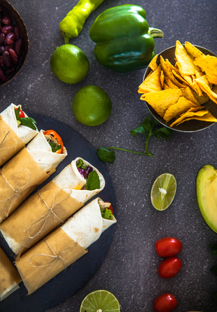 Tortilla wraps with vegetables. Mexican tortillas. Tacos with nachos and vegetablesの写真素材