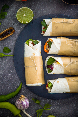 Tortilla wraps with vegetables. Mexican tortillas. Tacos with nachos and vegetablesの写真素材