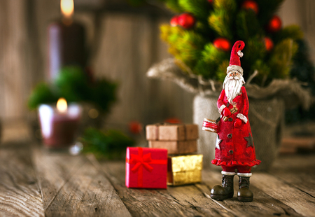 Christmas background. Santa Claus with Christmas tree,presents and gingerbread man.の写真素材