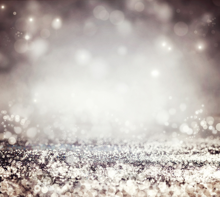 Festive background. Bokeh blurred background. Glitter vintage lightsの写真素材