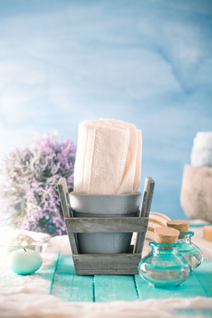 Spa and wellness setting with flowers and towels. Dayspa nature productsの写真素材