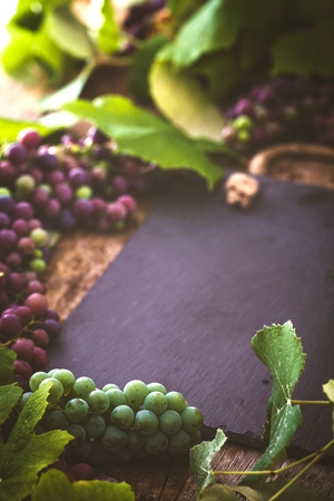 Wine. grapes on wood. Wine conceptの写真素材