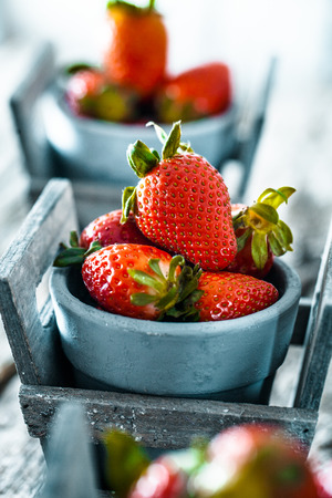 Fresh fruit. Strawberries on wood. Spring fruit.の写真素材