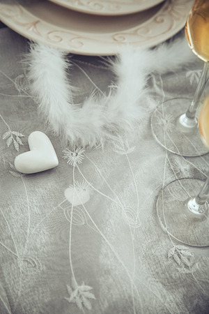 Valentines day table. Plate with  hearts. Valentine's day dinner.St. Valentine table settingの写真素材