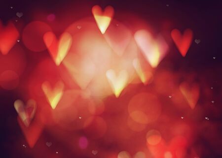 Valentines day. Valentines  abstract background with hearts and bokeh. Love red background. Valentines day glittering lightsの写真素材