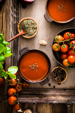 Tomato soup. Homemade tomato soup with tomatoes, herbs and spices. Comfort food.の写真素材
