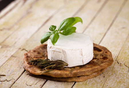 Fresh cheese on woodの写真素材