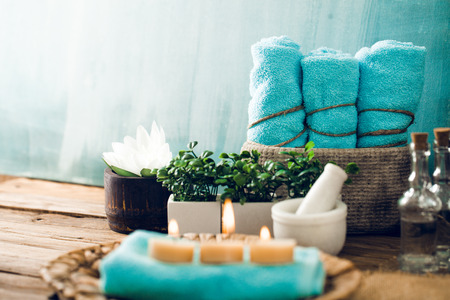 Spa and wellness setting with flowers and towels. Dayspa nature productsの写真素材