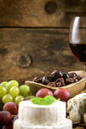 Cheese variety. Food background.  Fresh ingredients on woodの写真素材