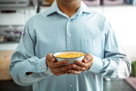 Man with healthy breakfast variety.の写真素材