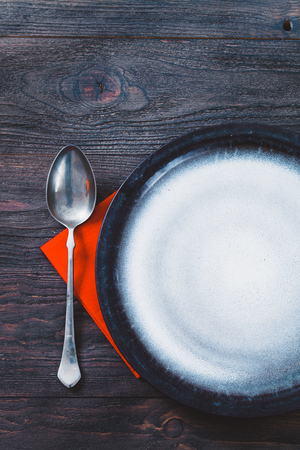 Restaurant series. Dinner with table setting in rustic wood style with cutleryの写真素材