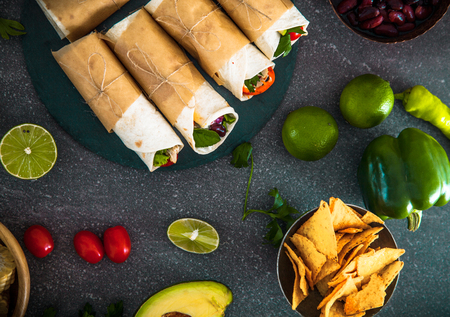 Tortilla wraps with vegetables. Mexican tortillas. Tacos with nachos and vegetablesの写真素材