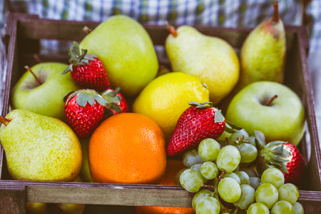 Fresh fruit. Farmer with bowl of fruit.s. Fruit basket.の写真素材