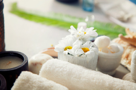 Spa and wellness. Fresh towels for spa treatment in natural setting. Cosmetic productsの写真素材