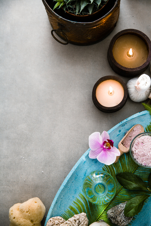 Spa and wellness. Spa products in natural setting with orchid flowerの写真素材