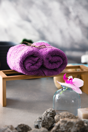 Spa and wellness. Spa products in natural setting with orchid flowerの写真素材
