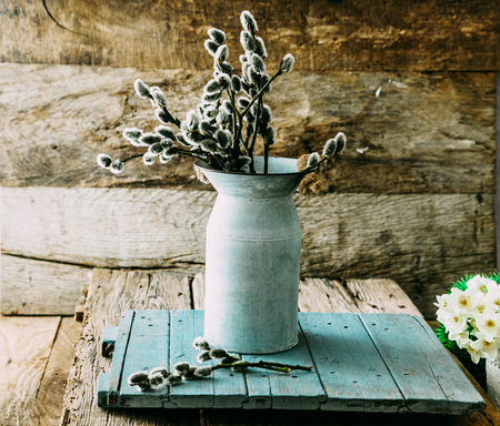 Spring flowers on wood. Rustic spring setting.の写真素材