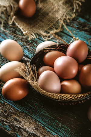 Organic eggs on wood. Fresh eggs. Healthy foodの写真素材