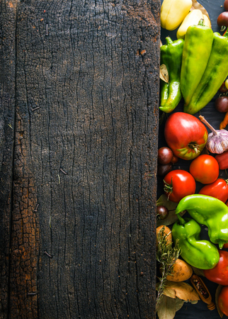 Vegetables on wood. Organic vegetables in rustic setting. Fresh food. Healthy veggiesの写真素材