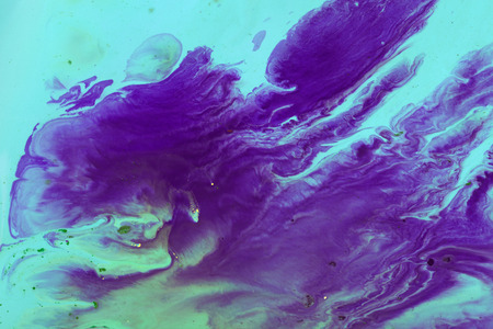 Ink in water. Abstract background. Ink swirling in water.の写真素材