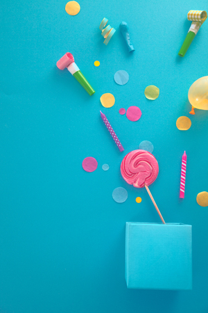 Birthday concept with gift box and confetti. Birthday baloons and candlesの写真素材