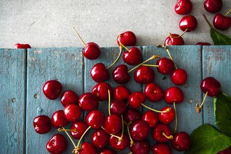 Fresh cherries on wood. Fresh organic fruit. Red cherriesの写真素材